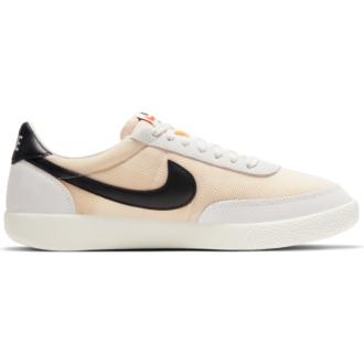 beige and black nike shoes